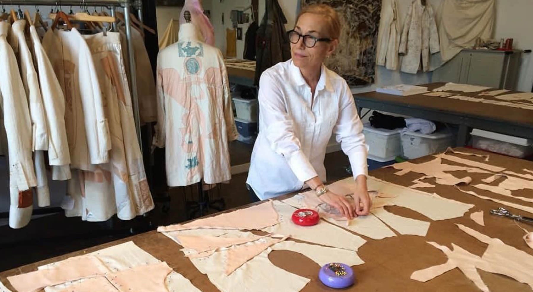 woman cutting patterns