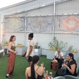 people outdoors socializing